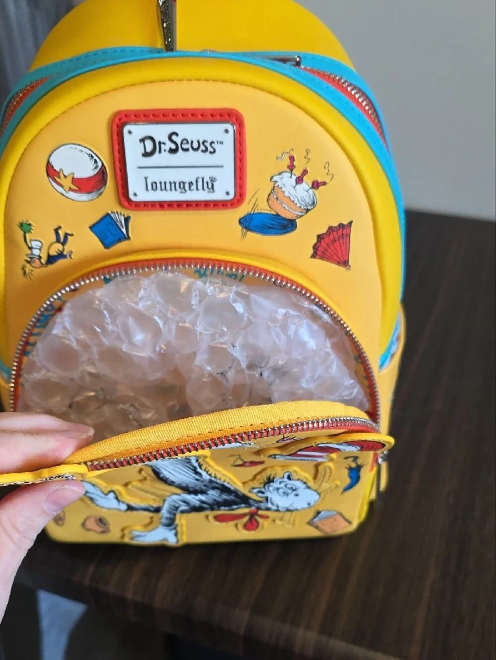 Loungefly Dr. Seuss Yellow Cat in the Hat Mini Backpack with Red & Blue Accents